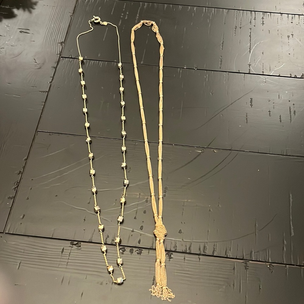 Pair of long gold necklaces